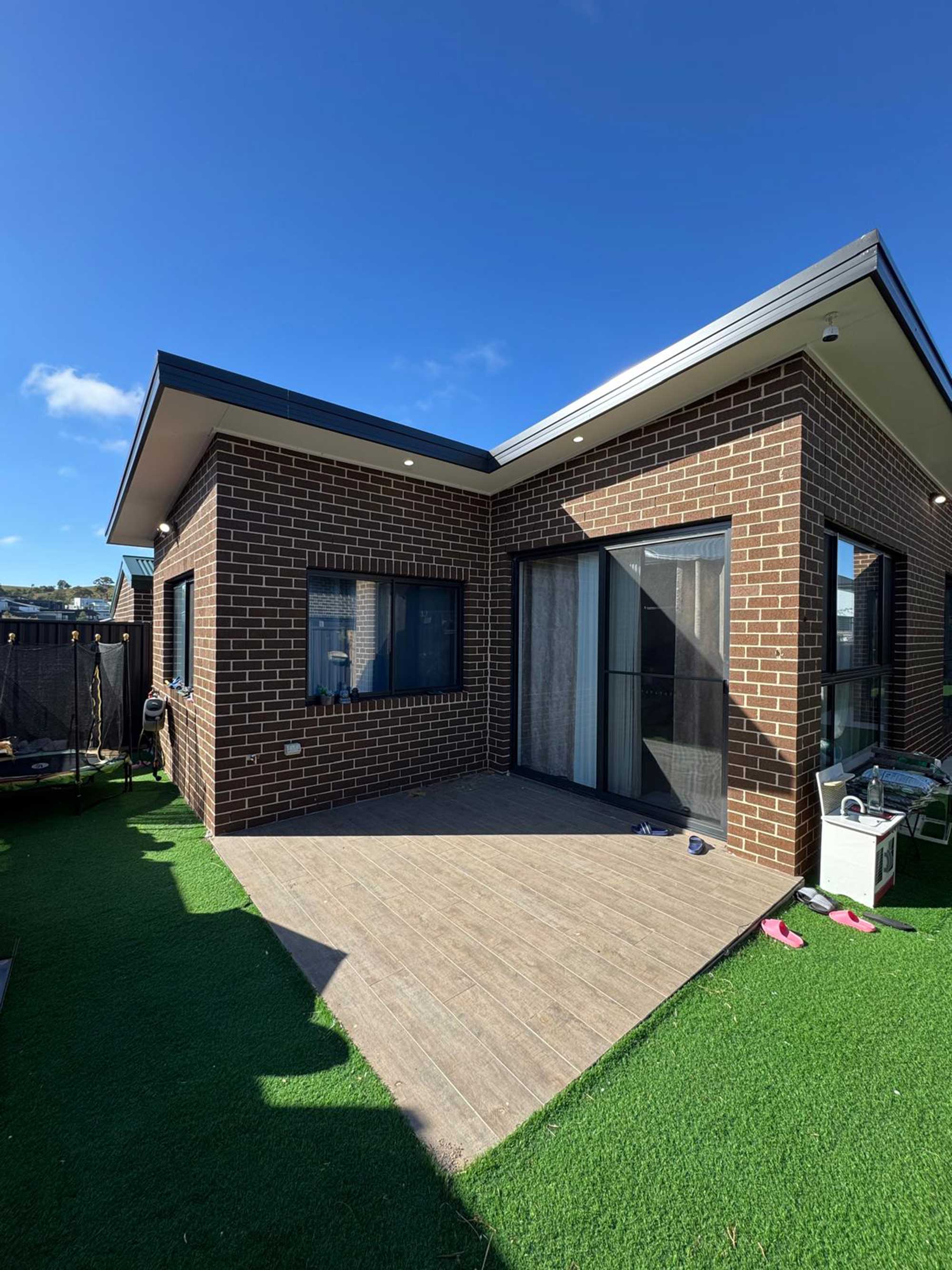 Backyard area in Taylor, Canberra before timber pergola installation