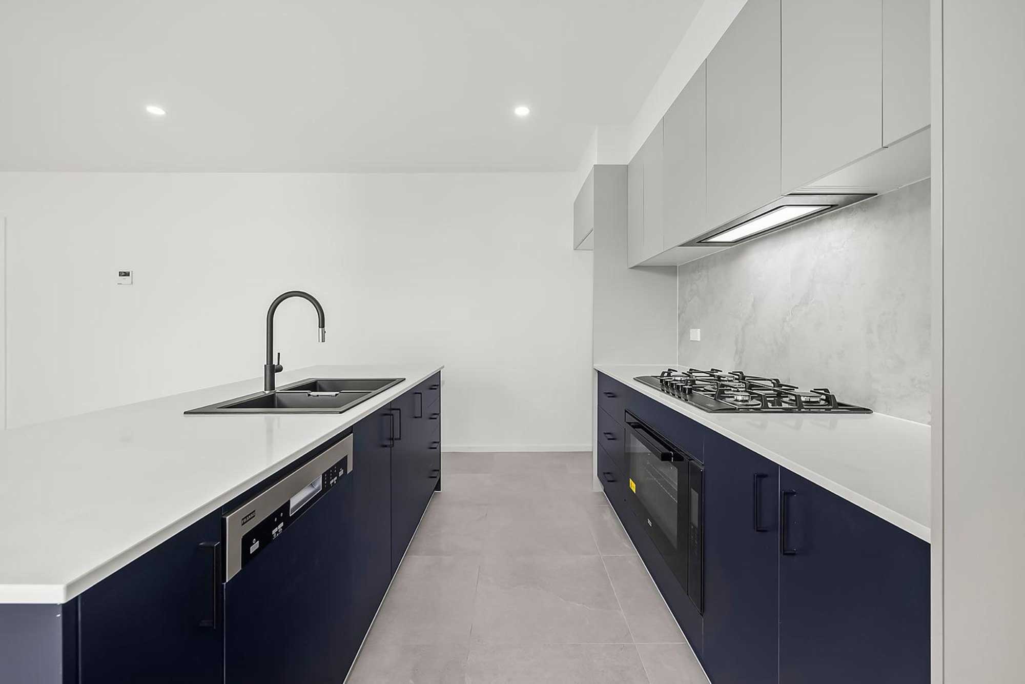 Whitlam Canberra kitchen renovation with stone island bench and integrated appliances